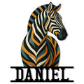 Colorful zebra portrait metal sign with bold black, cream, teal, and orange stripes