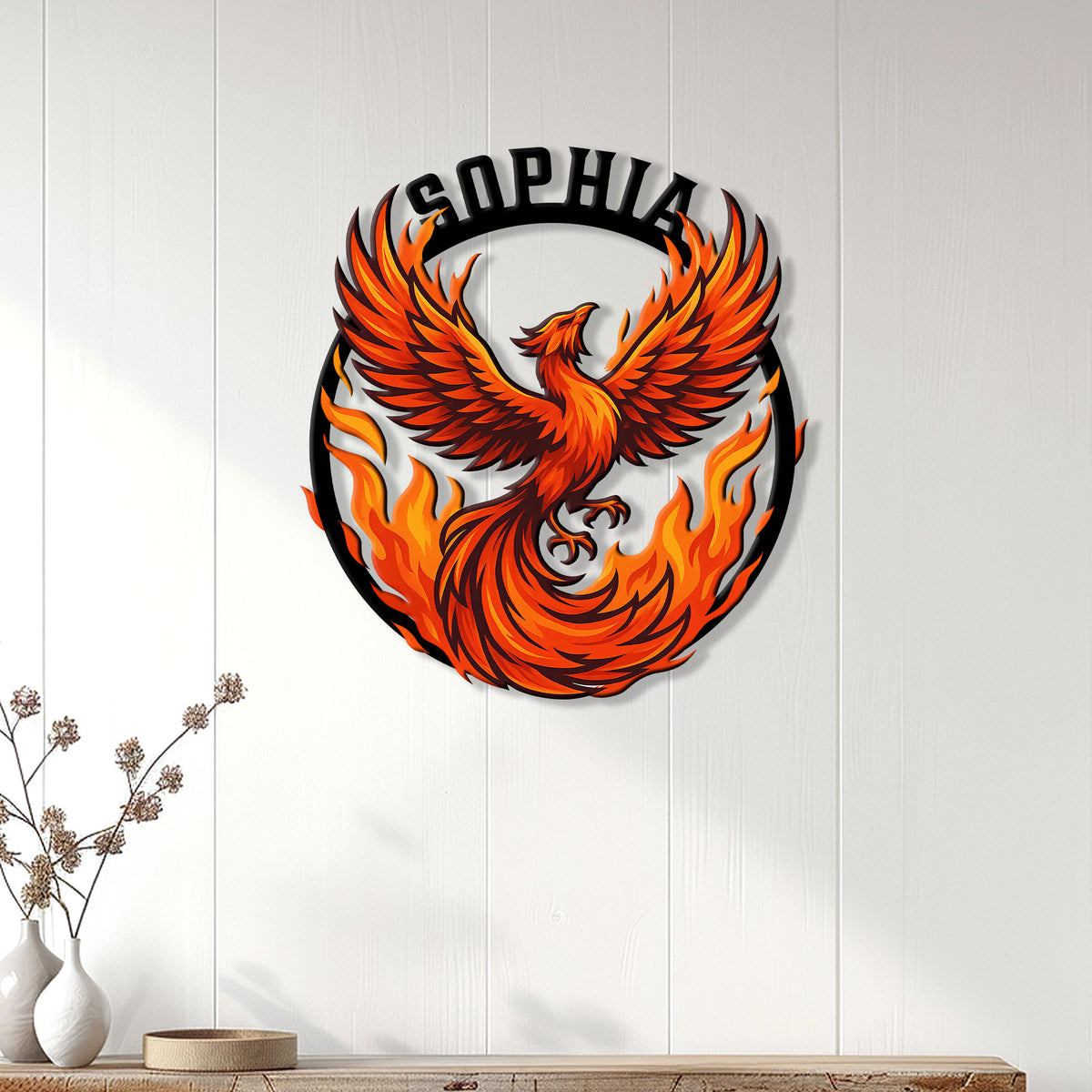 Orange phoenix wall decor displayed against a light paneled wall in a modern room