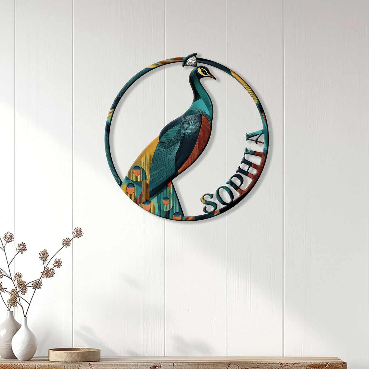 Colorful peacock wall sign displayed on white paneling above a console in a bright home interior