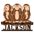 Three wise monkeys metal sign featuring see-no-evil, hear-no-evil, and speak-no-evil poses
