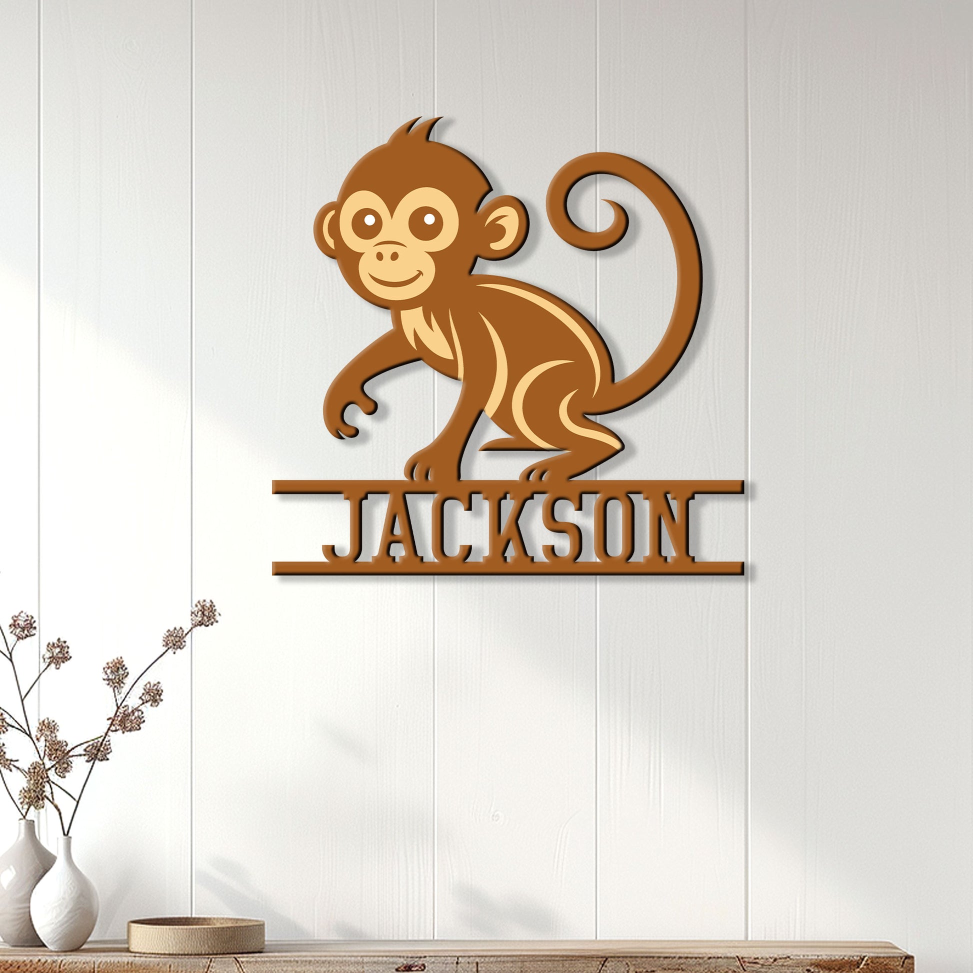 Monkey metal wall sign displayed on a light paneled wall in a bright home setting