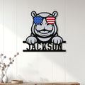 Patriotic hippo metal wall sign displayed on a light paneled wall in a modern living space