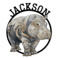 Ornate hippo metal sign featuring a detailed gray and gold wildlife illustration inside a bold circular frame