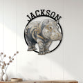 Ornate hippo wall sign displayed on a light wood-paneled wall above a console table