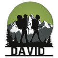 Custom hiking metal sign featuring a family of trail hikers silhouetted against snowy mountain peaks
