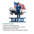 Pilot metal sign feature graphic showing an airline captain, passenger plane, and patriotic aviation artwork
