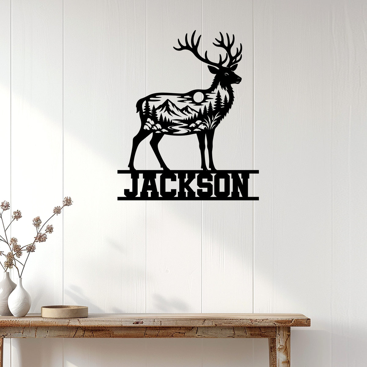 Deer wall decor displayed above a rustic console table in a bright home interior