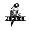 Custom parrot metal sign featuring a macaw silhouette filled with mountains, lake scenery, and tropical foliage