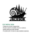 Snail metal sign shown with a woodland forest scene, spiral shell, and decorative cut-metal silhouette
