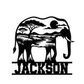 Elephant metal sign featuring an African savanna silhouette with acacia trees, mountains, water, and sunset