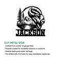 Bison cut metal sign shown with a detailed mountain, forest, and lake design in a product feature layout