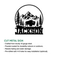 Bison metal sign feature graphic showing a buffalo, mountain landscape, pine forest, and cut-metal design
