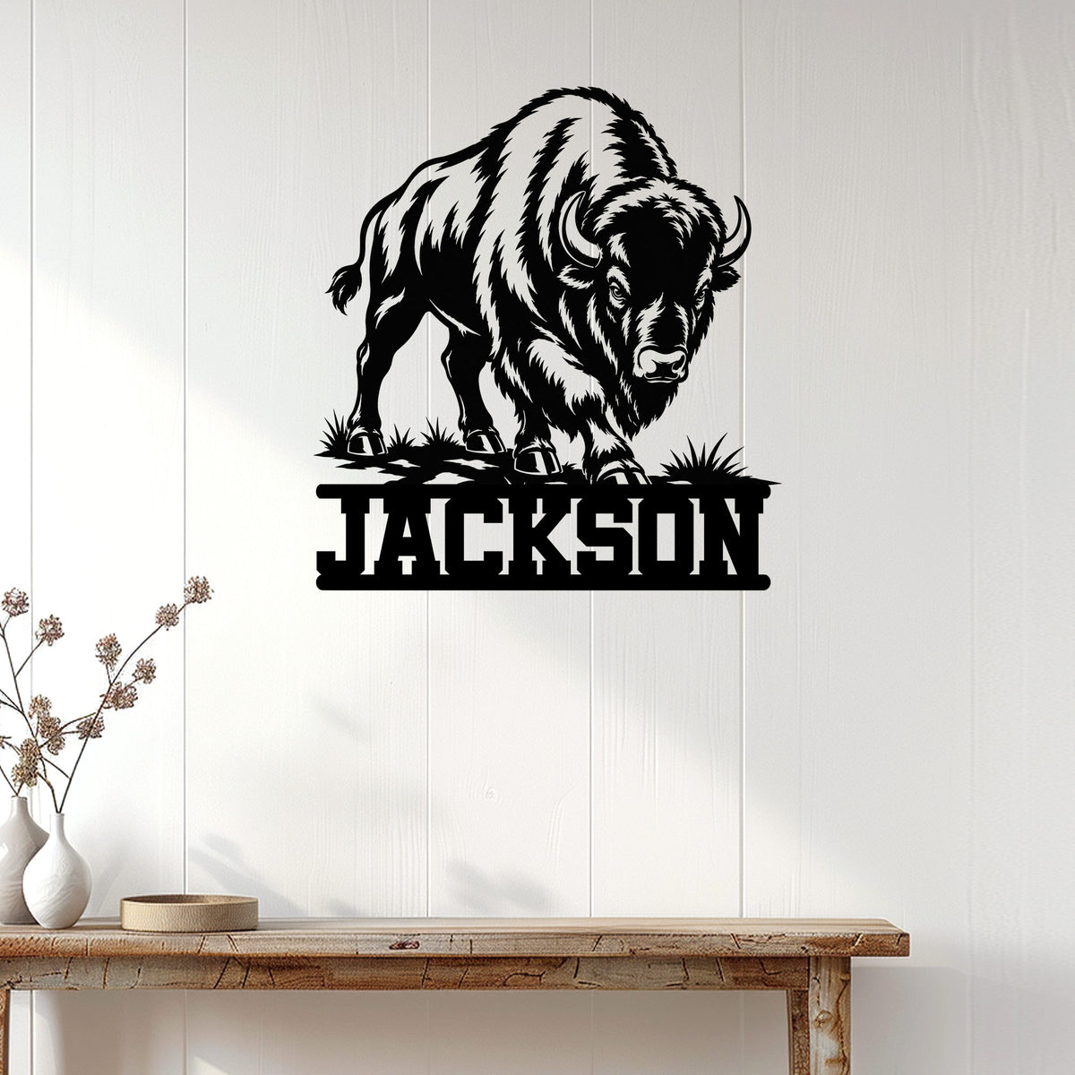Bison metal wall sign displayed on a bright wood-paneled wall in a welcoming home