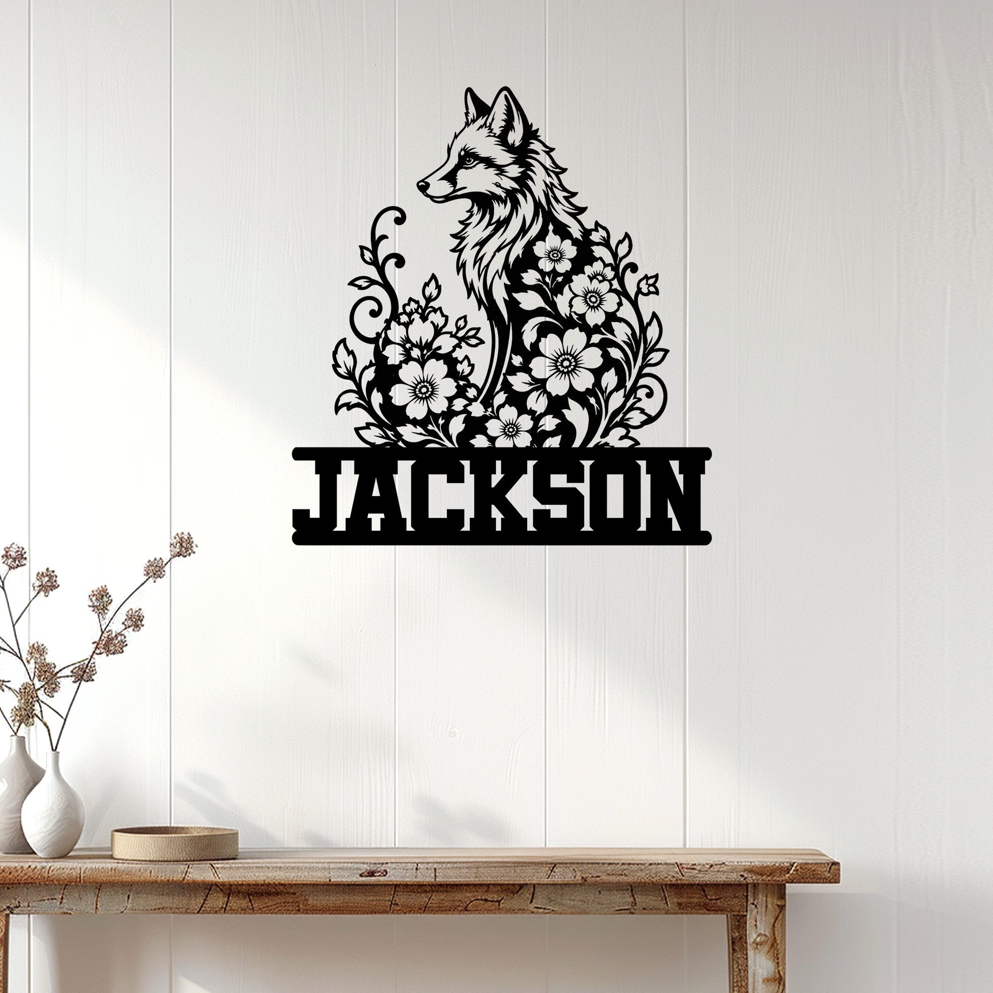 Floral fox metal sign displayed on a white paneled wall above a rustic console table