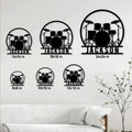Drum set metal sign size guide showing multiple available square dimensions on a living room wall