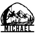 Rock climbing metal sign featuring a climber on a cliff with mountain peaks, pine trees, and a custom design