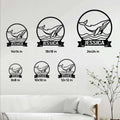 Whale metal sign displayed in multiple sizes, featuring a circular ocean scene and wave banner