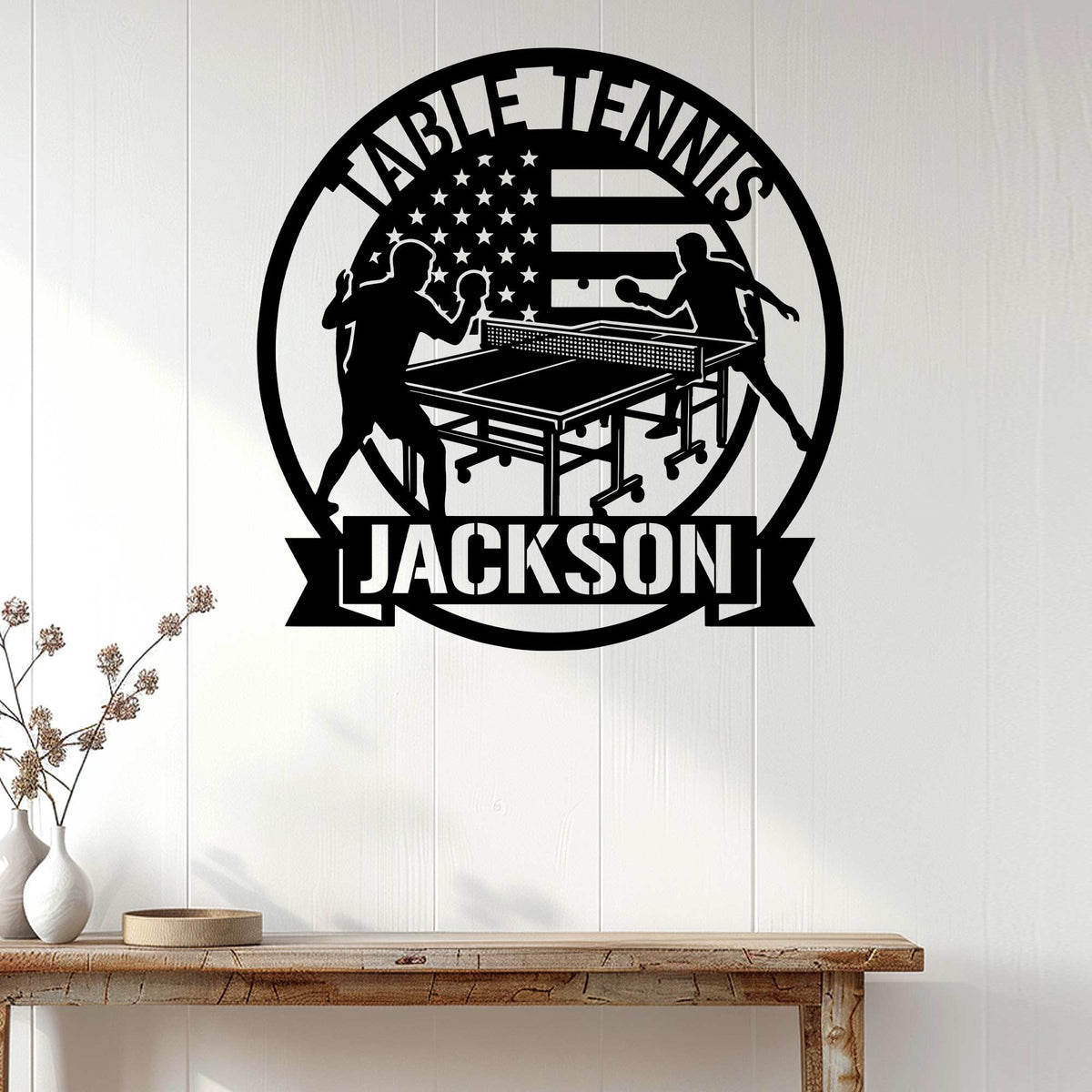 Table tennis wall decor displayed on a light wood wall above a console table