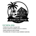 Cut metal beach house sign featuring a tropical bungalow scene with palm trees and coastal shoreline