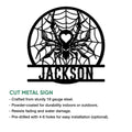 Spider metal sign feature graphic showing the web-and-heart artwork in a cut metal sign design
