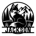 Black fox metal sign featuring a seated fox framed by evergreen trees and mountain peaks