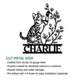 Cut metal tabby cat sign featuring a playful cat reaching toward flowering branches