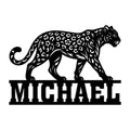 Black leopard metal sign featuring a walking spotted big cat silhouette and bold lower lettering