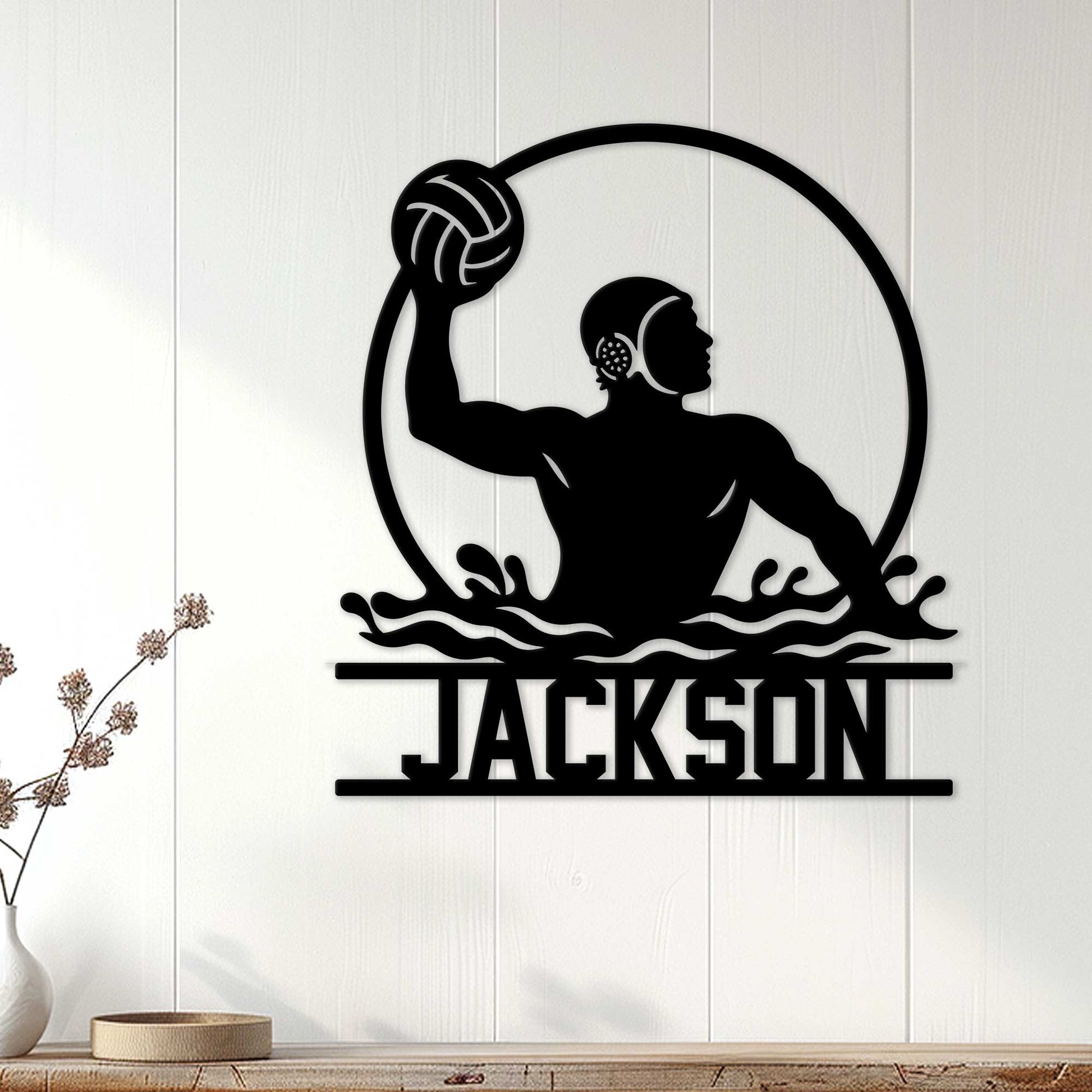 Water polo wall decor displayed on a light wood-paneled wall above a console table