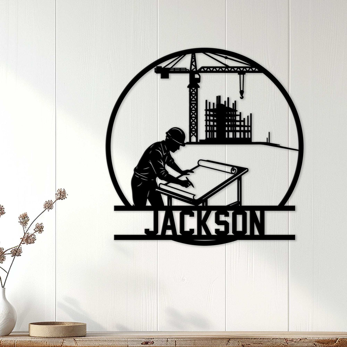 Civil engineering wall decor displayed on a light wood wall, featuring a drafting engineer and construction crane