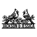 Custom cardinal metal sign featuring two birds perched on a flowering branch in a bold black silhouette design