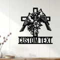 Cardinal cross wall sign displayed on white wood paneling as meaningful bird-inspired home decor