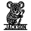 Black koala metal sign featuring a friendly koala holding a eucalyptus branch
