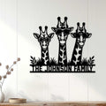 Giraffe family wall decor displayed on a light paneled wall in a welcoming home interior