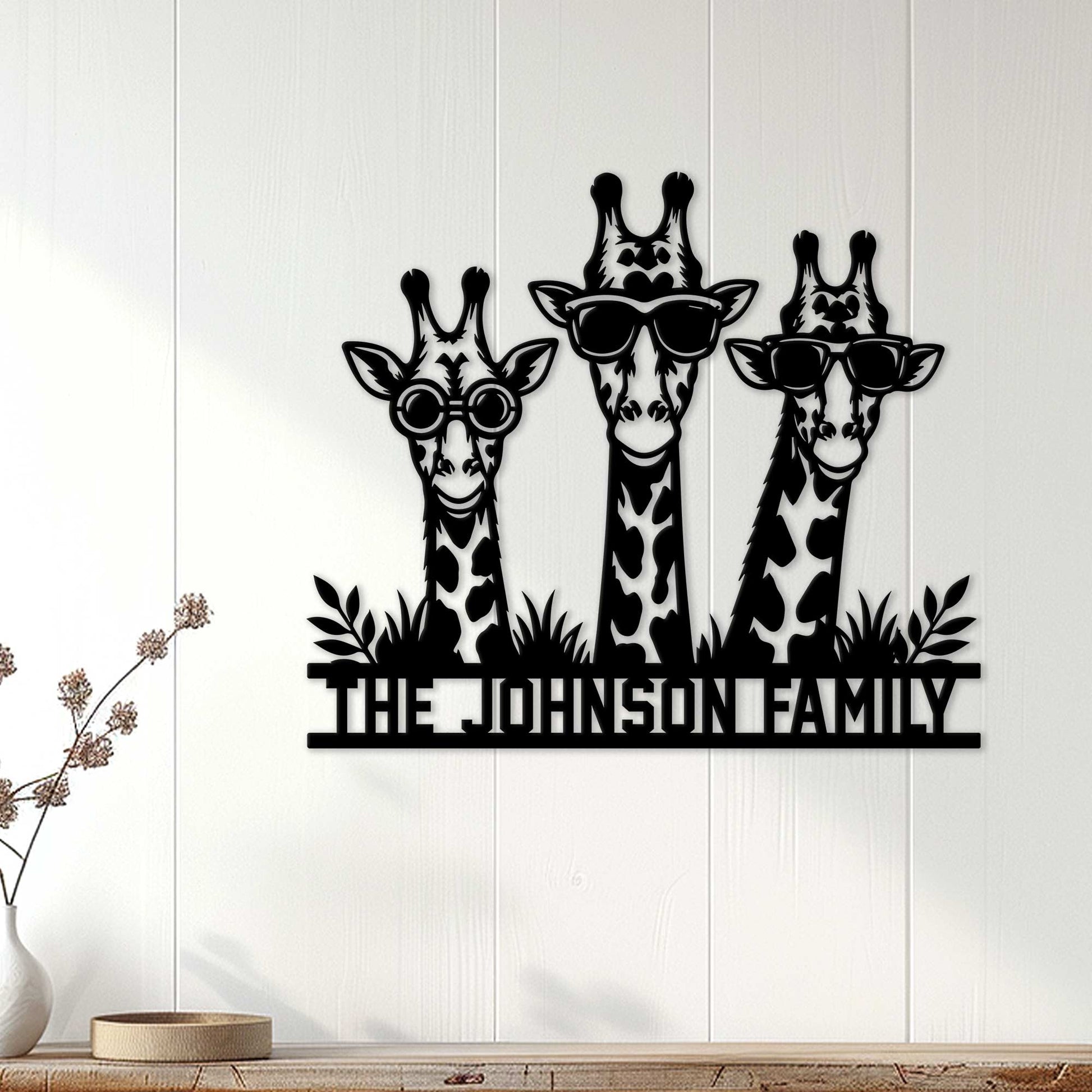 Giraffe family wall decor displayed on a light paneled wall in a welcoming home interior