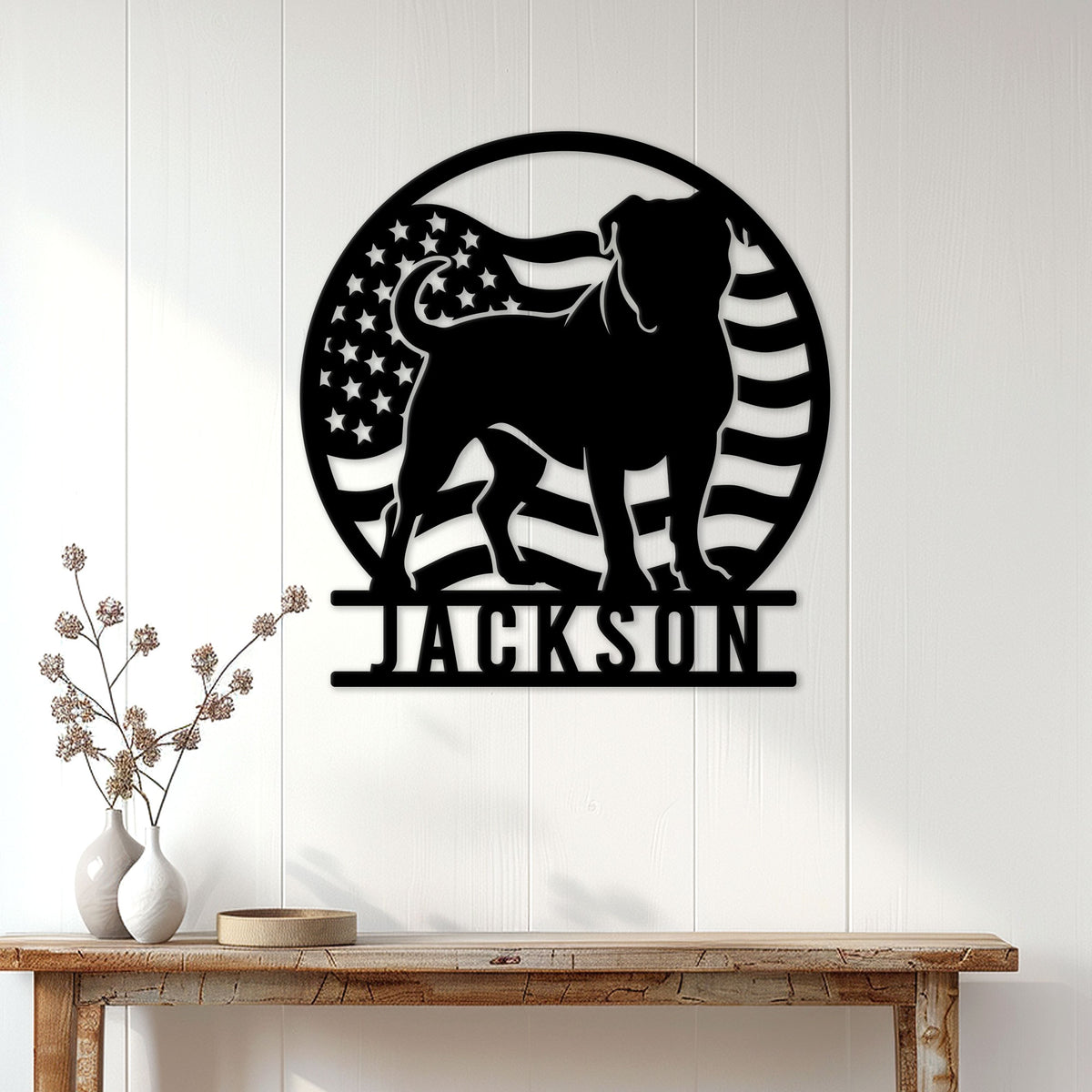 American Bulldog metal wall sign displayed on a light paneled wall above a console table