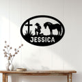 Cowgirl horse metal wall sign displayed on a light wood-paneled wall above a rustic console table