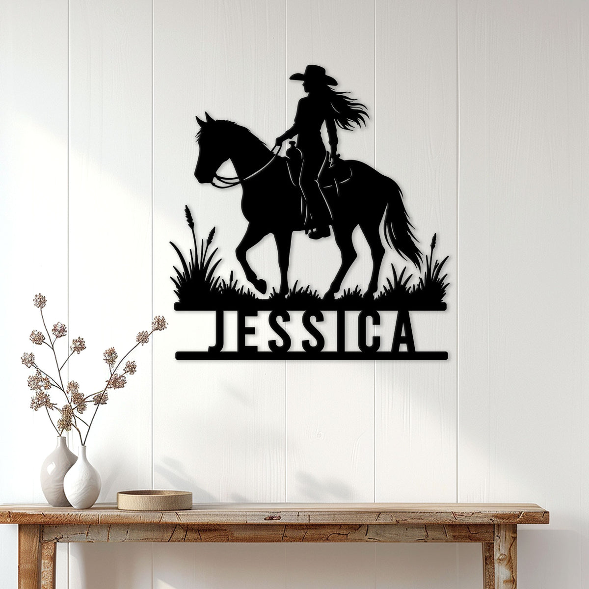 Cowgirl riding horse silhouette sign displayed on a bright farmhouse-style wall