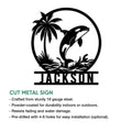 Orca metal sign shown as a cutout wall design with a breaching whale and tropical island scene