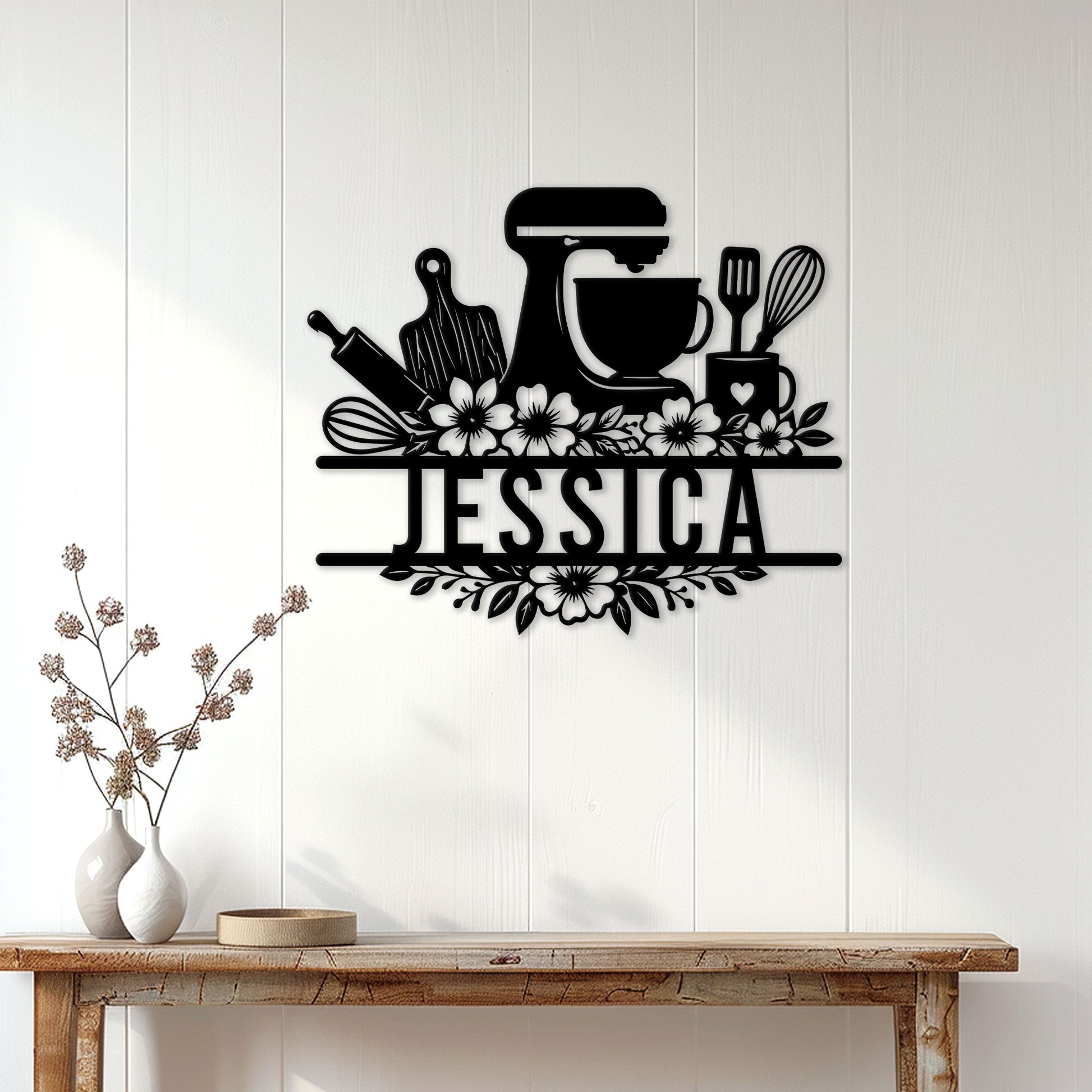 Baker metal wall sign displayed above a console table in a bright kitchen-inspired home setting