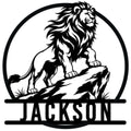 Bold lion standing on a rocky ledge inside a circular frame on a custom metal sign