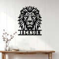 Geometric lion metal wall sign displayed on a bright paneled wall above a console table