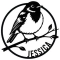 Custom robin metal sign featuring a bold black-and-white bird perched on a leafy branch