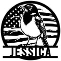 Black robin metal sign featuring a detailed bird silhouette against a patriotic American flag design