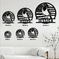 Robin metal sign shown in multiple sizes on a bright living room wall above a white sofa