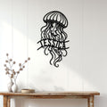 Jellyfish metal wall decor displayed on a white paneled wall above a rustic console table