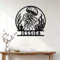 Jellyfish ocean wall decor displayed above a console table in a bright coastal home