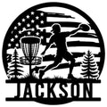 Custom disc golf metal sign with a throwing player, basket, pine trees, and patriotic flag silhouette