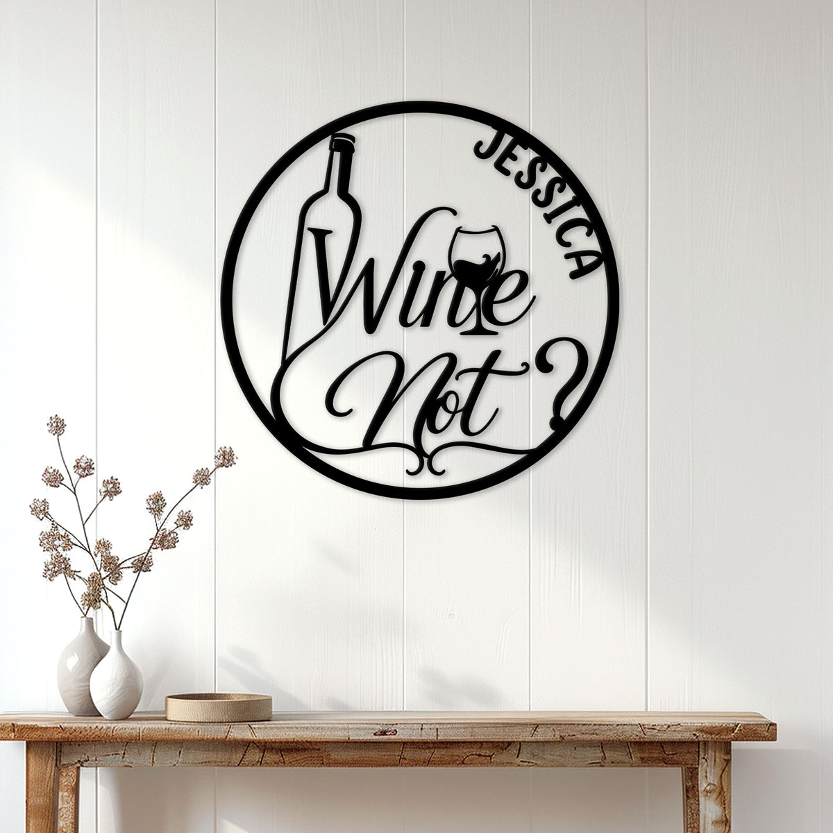 Round wine wall sign displayed above a console table in a bright modern home