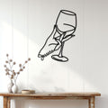 Wine-themed metal wall sign displayed above a console table in a bright home interior