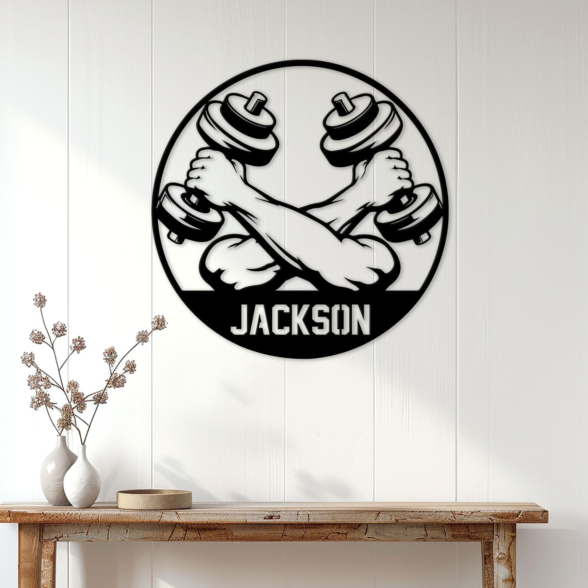Weightlifting metal wall sign displayed on a bright paneled wall above a rustic console table